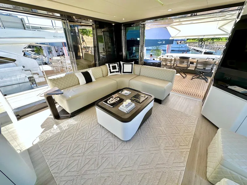 Slide: The Image of Luxurious interior of Schaefer 770 yacht, 2025 model, featuring elegant seating and modern decor. - 9
