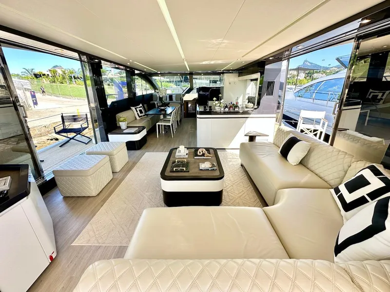 Slide: The Image of Luxurious interior of 2025 Schaefer 770 yacht with modern furnishings and panoramic windows. - 15