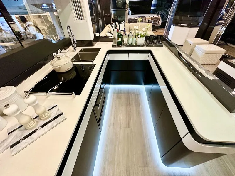 Slide: The Image of Modern kitchen in 2025 Schaefer 770 yacht with sleek design and ambient lighting. - 23