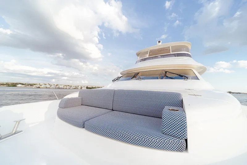 Slide: The Image of Luxurious 2007 Hargrave 78 Open Bridge yacht with elegant outdoor seating. - 13