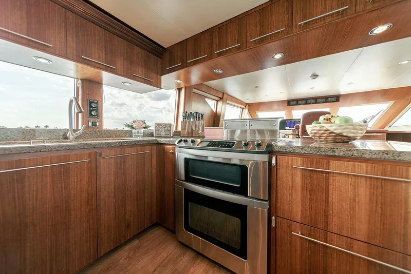 Slide: The Image of Luxurious kitchen interior of 2007 Hargrave 78 Open Bridge yacht with modern appliances. - 19