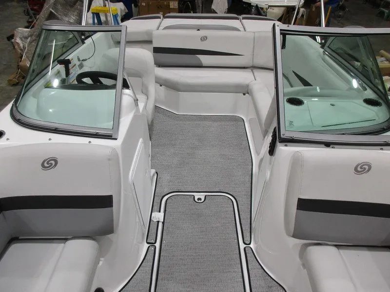 Slide: The Image of 2023 Hurricane SunDeck 187 IO interior with gray seating and carpeted flooring. - 11