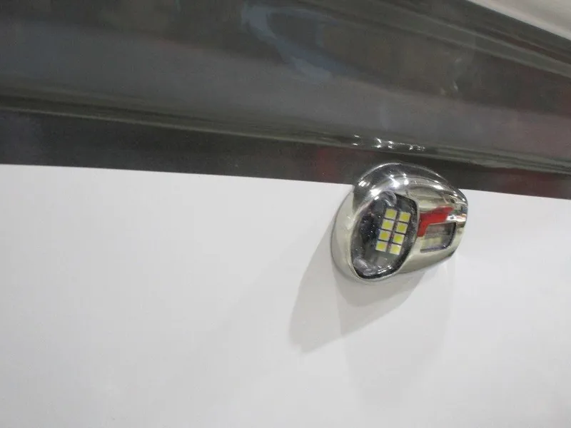 Slide: The Image of 2023 Hurricane SunDeck 187 IO boat LED light detail. - 7