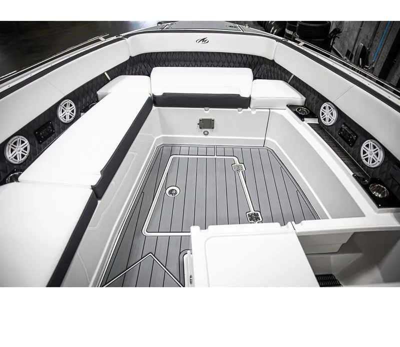 Slide: The Image of 2022 Monterey 38 Super Sport boat interior with white seating and gray flooring. - 9