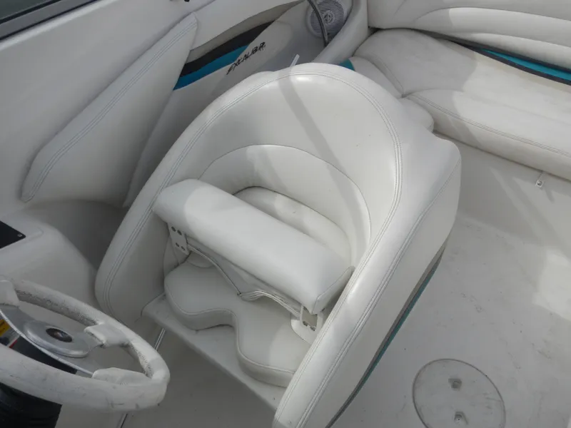 Slide: The Image of Wellcraft EXCALIBUR 2000 boat interior with white leather seats and steering wheel. - 12