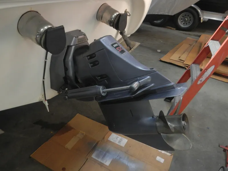 Slide: The Image of Rear view of 2000 Wellcraft EXCALIBUR boat with visible outboard motor and propeller. - 16