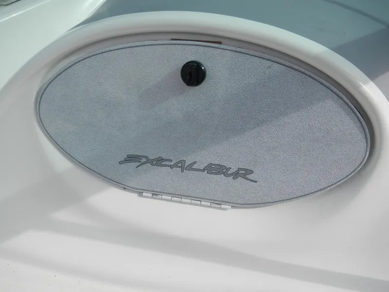 Slide: The Image of Wellcraft EXCALIBUR 2000 boat dashboard compartment with logo. - 7