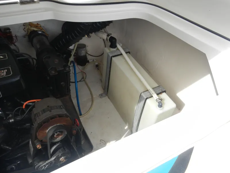 Slide: The Image of Engine compartment of a 2000 Wellcraft EXCALIBUR boat showing mechanical components. - 8
