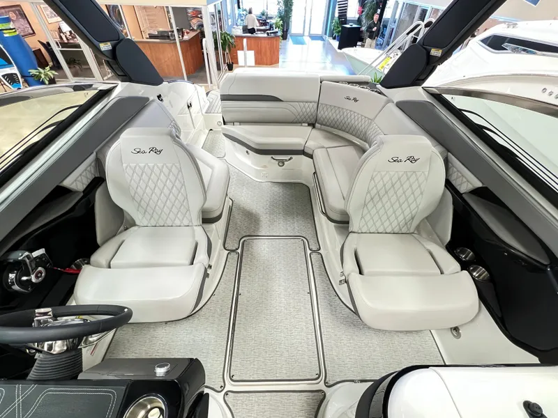 Slide: The Image of 2023 Sea Ray SLX 260 boat interior with luxurious seating and modern design. - 6