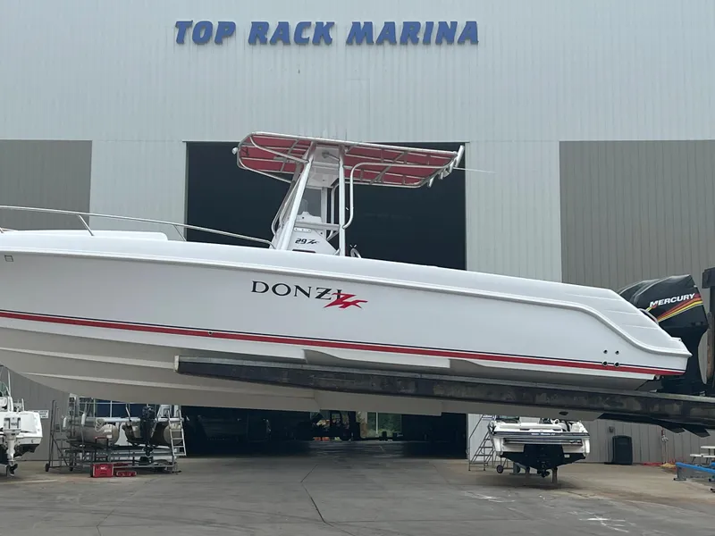 Slide: The Image of 2002 Donzi 29 ZF Cuddy boat at Top Rack Marina. - 3