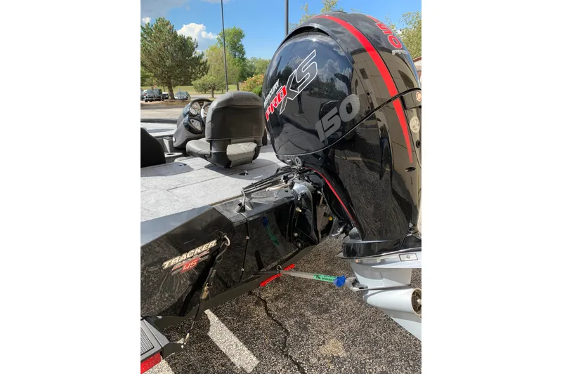 Slide: The Image of 2023 Tracker Pro Team 195 TXW Tournament Edition boat with powerful 150 HP engine. - 9