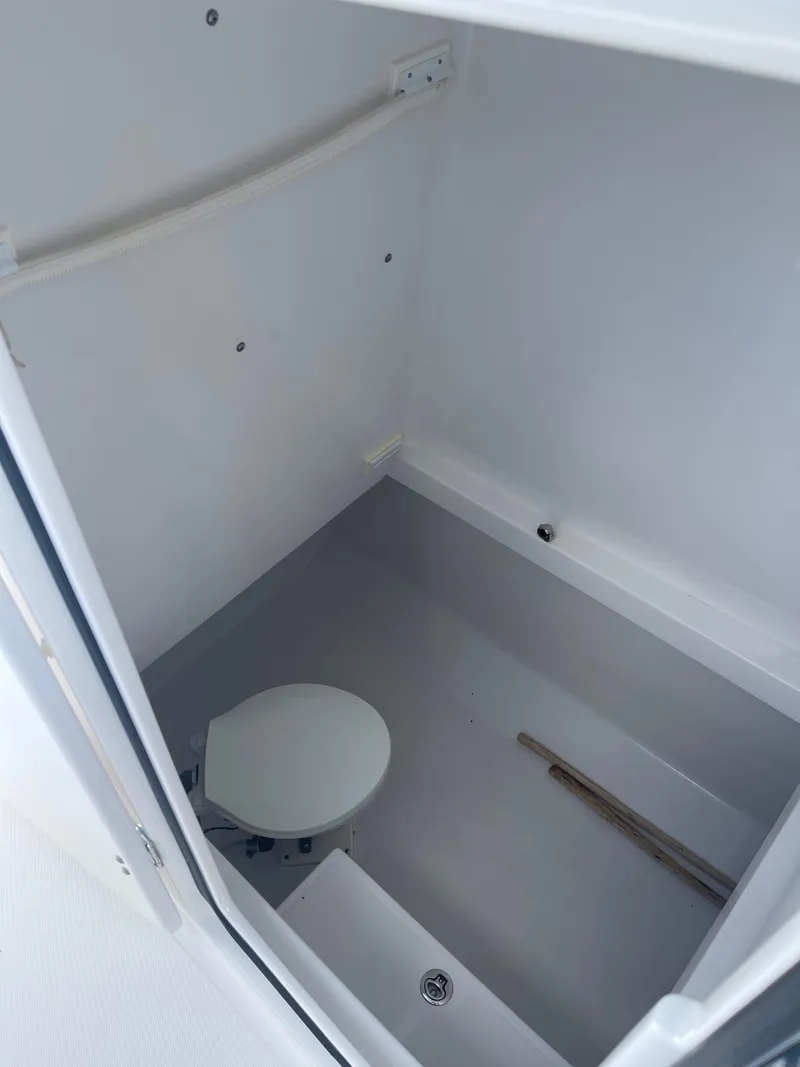 Slide: The Image of 2013 Bahama Open Fisherman boat interior with toilet and storage space - 26