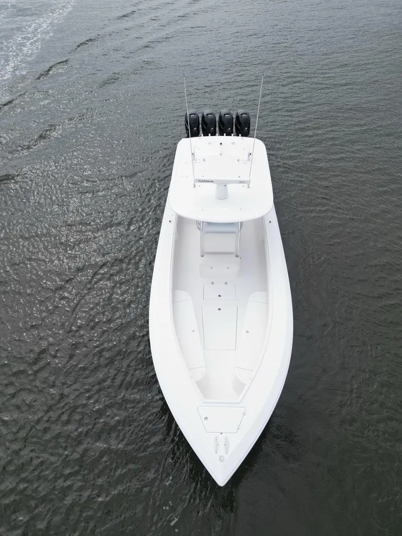 Slide: The Image of 2013 Bahama Open Fisherman boat on water, aerial view. - 9
