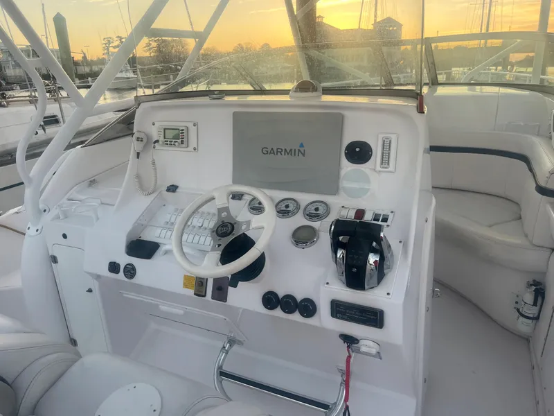 Slide: The Image of 2008 Donzi 38 ZSF boat helm with Garmin navigation system at sunset. - 20