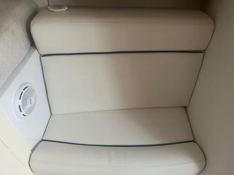 Slide: The Image of 2008 Donzi 38 ZSF boat interior seating with speaker. - 28