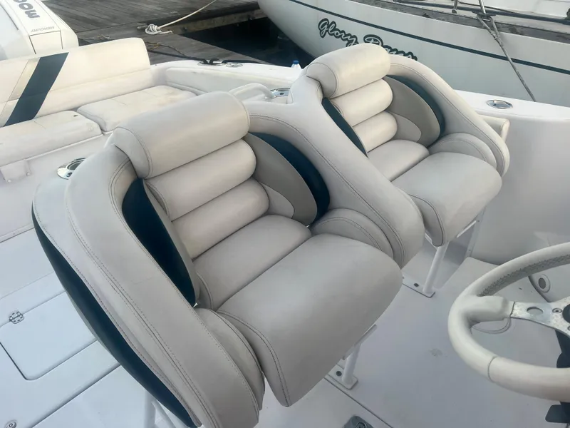 Slide: The Image of 2008 Donzi 38 ZSF boat with plush white and black seating. - 32