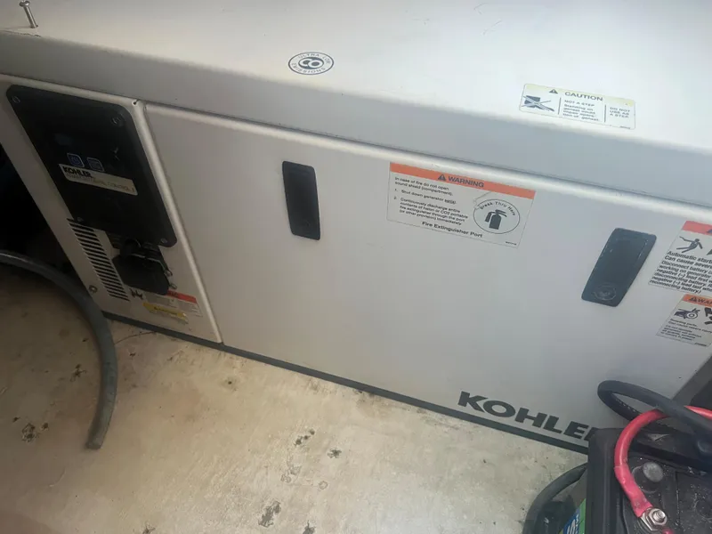 Slide: The Image of Kohler generator in a 2008 Donzi 38 ZSF boat. - 33