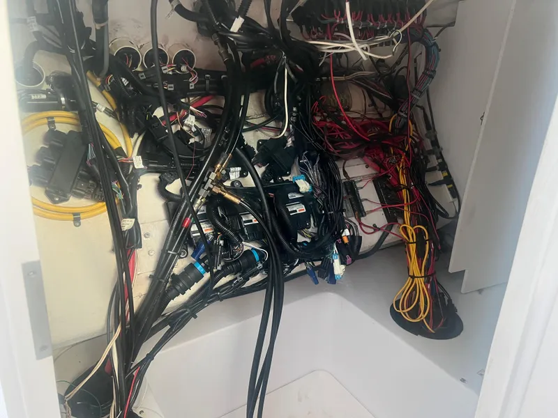 Slide: The Image of 2008 Donzi 38 ZSF boat wiring and electrical system compartment. - 30