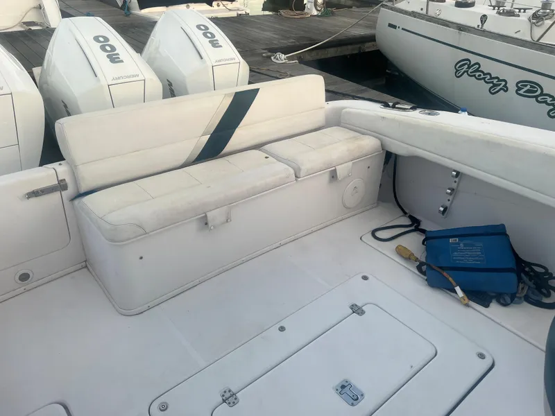 Slide: The Image of 2008 Donzi 38 ZSF boat interior with seating and storage compartments. - 31
