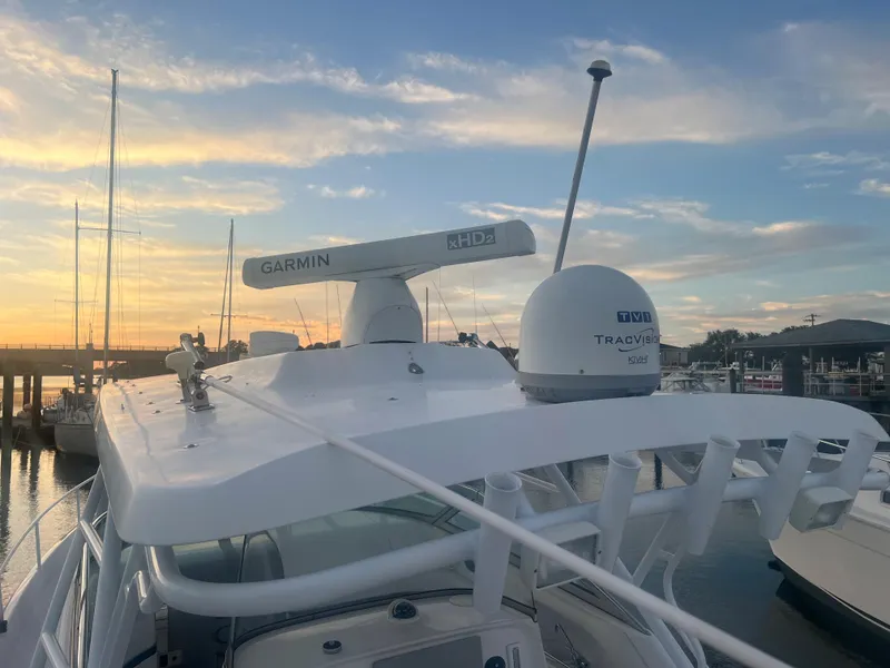Slide: The Image of 2008 Donzi 38 ZSF boat with Garmin radar at sunset in marina. - 36