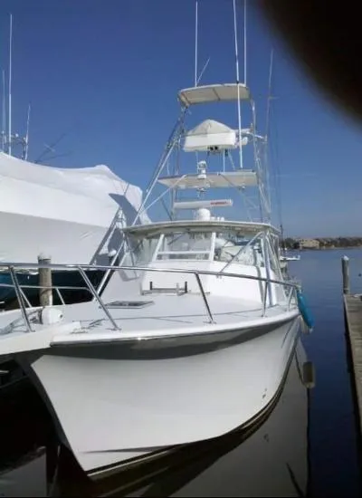 The Image of 2002 Jersey 36 Express boat docked on a sunny day. - 0