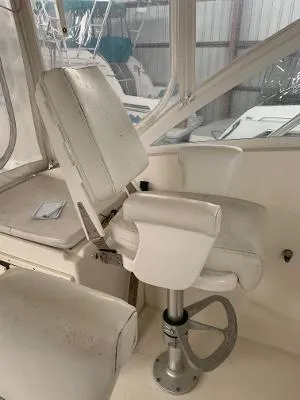 Slide: The Image of Captain's chair on a 2002 Jersey 36 Express boat. - 20