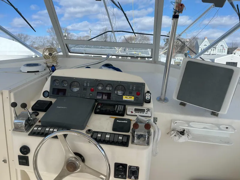 Slide: The Image of Control panel of a 2002 Jersey 36 Express boat with navigation equipment. - 29