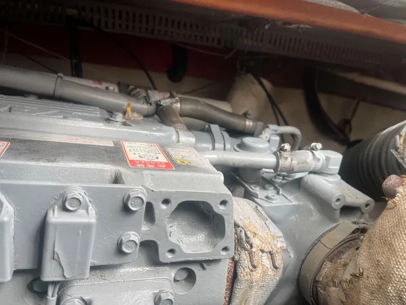 Slide: The Image of Close-up of a 2002 Jersey 36 Express boat engine. - 43