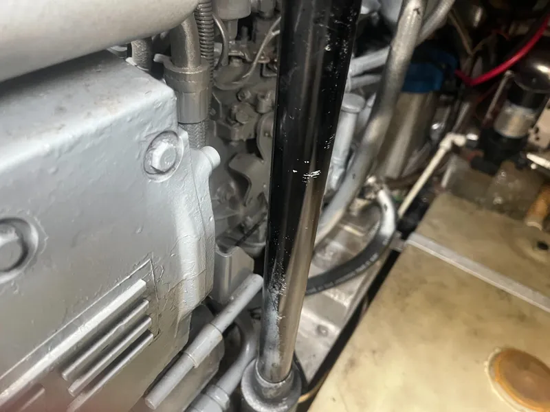 Slide: The Image of Close-up of a 2002 Jersey 36 Express engine compartment showing mechanical components. - 45