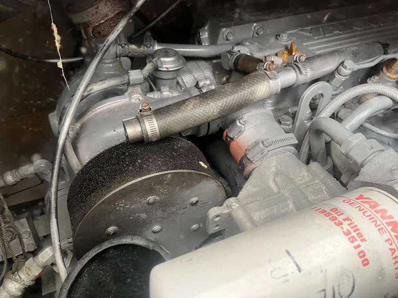 Slide: The Image of 2002 Jersey 36 Express engine close-up with Yanmar genuine parts. - 48