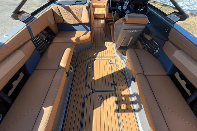 Slide: The Image of Interior of 2023 Nautique Super Air Nautique G25 with luxurious seating. - 15