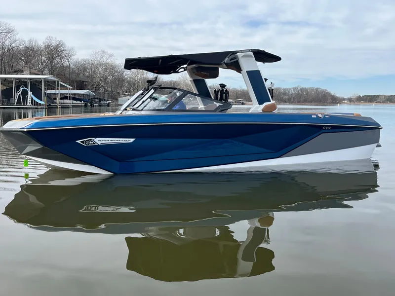 Slide: The Image of 2023 Nautique Super Air Nautique G25 on calm water. - 4