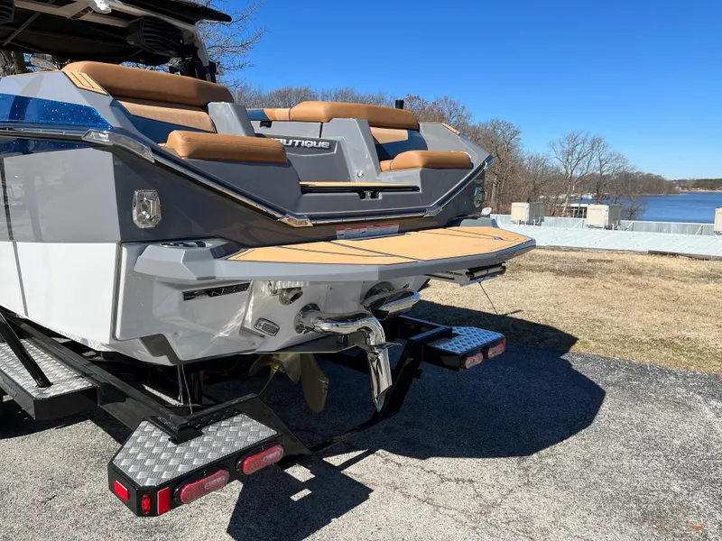 Slide: The Image of 2023 Nautique Super Air Nautique G25 parked by the shore. - 8