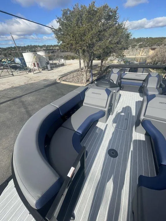 Slide: The Image of 2023 Berkshire 25UL STS 3.0 pontoon boat with spacious seating and modern design. - 18