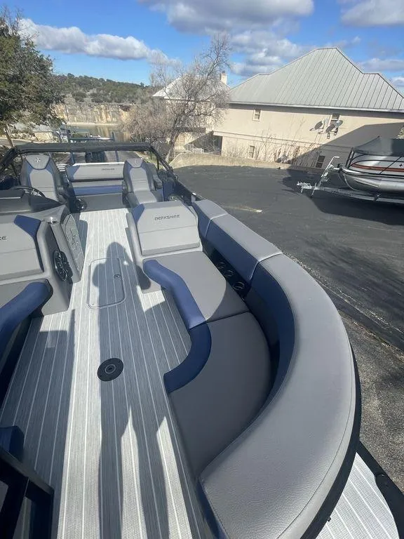 Slide: The Image of 2023 Berkshire 25UL STS 3.0 pontoon boat with spacious seating and sleek design. - 19