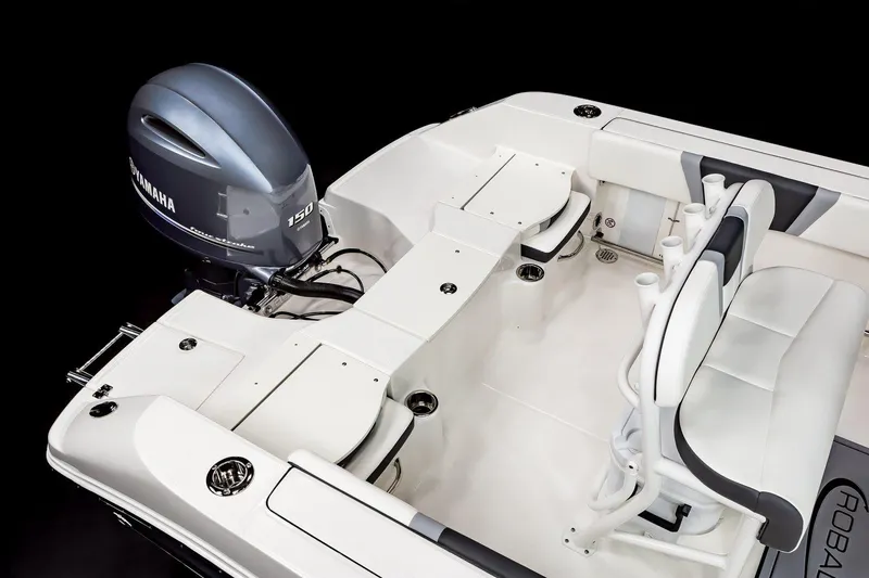 Slide: The Image of 2025 Robalo R200 Center Console boat with Yamaha 150 engine, sleek white interior design. - 21