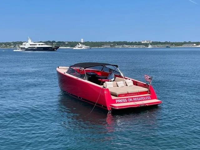 The Image of Red 2010 VanDutch 40 yacht named Press On Regardless on calm waters. - 0