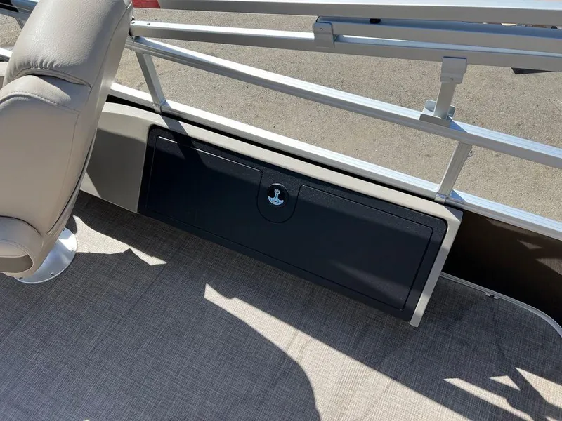 Slide: The Image of 2023 Sun Tracker SportFish™ 22 XP3 boat interior with storage compartment. - 10