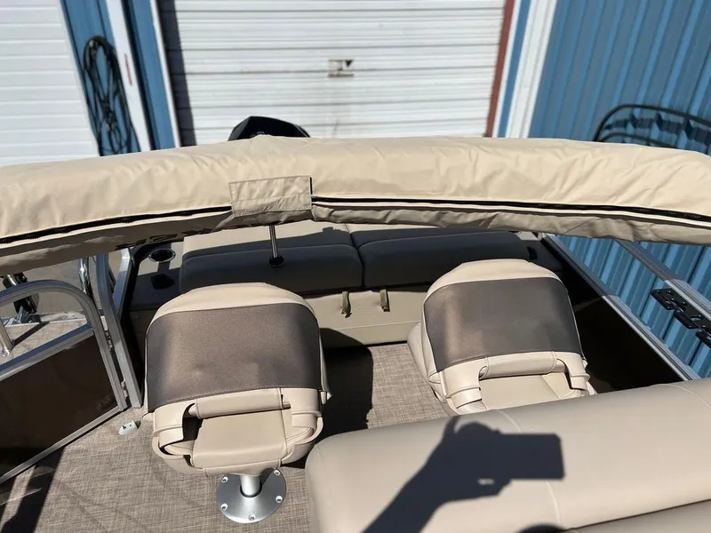 Slide: The Image of 2023 Sun Tracker SportFish™ 22 XP3 boat interior with beige seating. - 13
