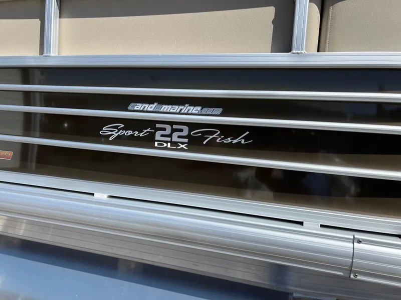 Slide: The Image of 2023 Sun Tracker SportFish™ 22 XP3 pontoon boat side view. - 16