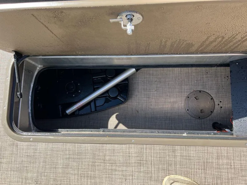 Slide: The Image of Storage compartment of 2023 Sun Tracker SportFish™ 22 XP3 pontoon boat. - 8