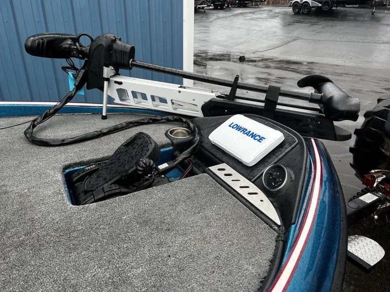 Slide: The Image of 2017 Triton 19 TrX boat with Lowrance fishfinder and trolling motor on deck. - 5