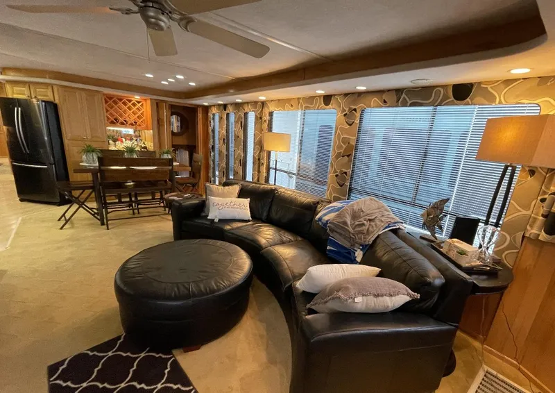 Slide: The Image of Luxurious Sumerset 16x75 houseboat interior with leather seating and modern kitchen, 2000 model. - 6