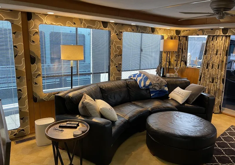 Slide: The Image of Luxurious Sumerset 16x75 houseboat interior with leather sofa and modern decor, year 2000. - 7