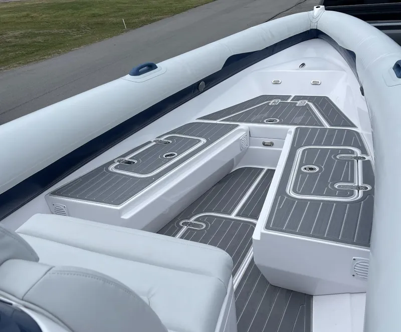 Slide: The Image of 2022 Airship 300 DS boat interior with sleek, modern deck design. - 15