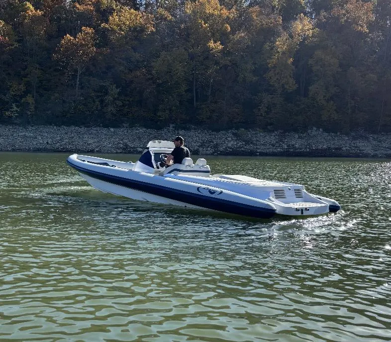 Slide: The Image of Airship 300 DS boat cruising on a lake, 2022 model. - 5