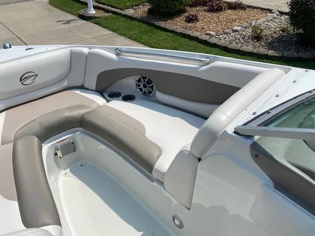 Slide: The Image of Interior of a 2014 Crownline 215 SS boat with beige seating. - 3