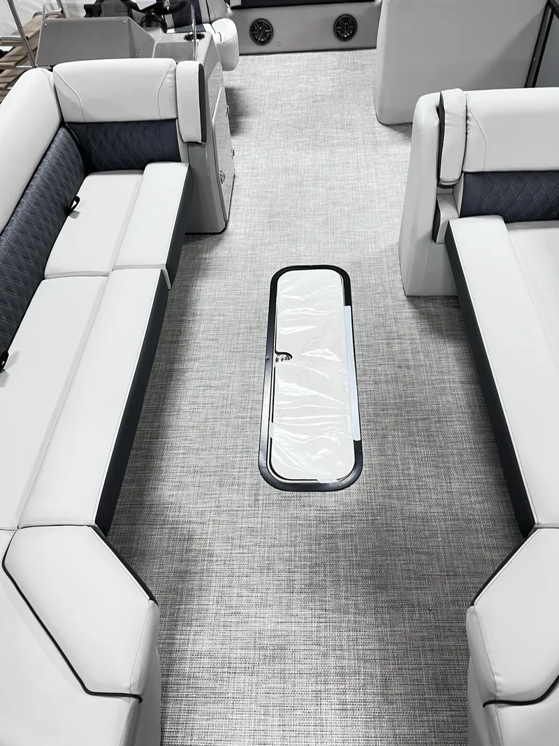 Slide: The Image of 2024 Harris Sunliner 250 interior with sleek seating and modern flooring. - 12