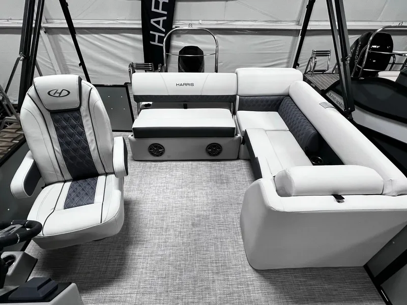 Slide: The Image of 2024 Harris Sunliner 250 interior with luxurious seating and modern design. - 13