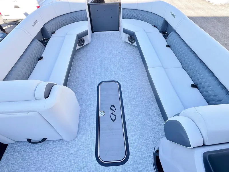 Slide: The Image of 2024 Harris Sunliner 250 interior with spacious seating and modern design. - 3